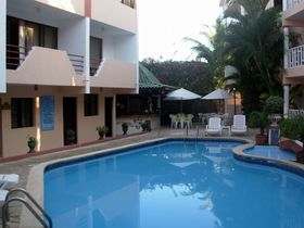 Apart Hotel El Candil Bar